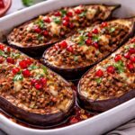 Запечённые баклажаны с фаршем и гранатовым соусом